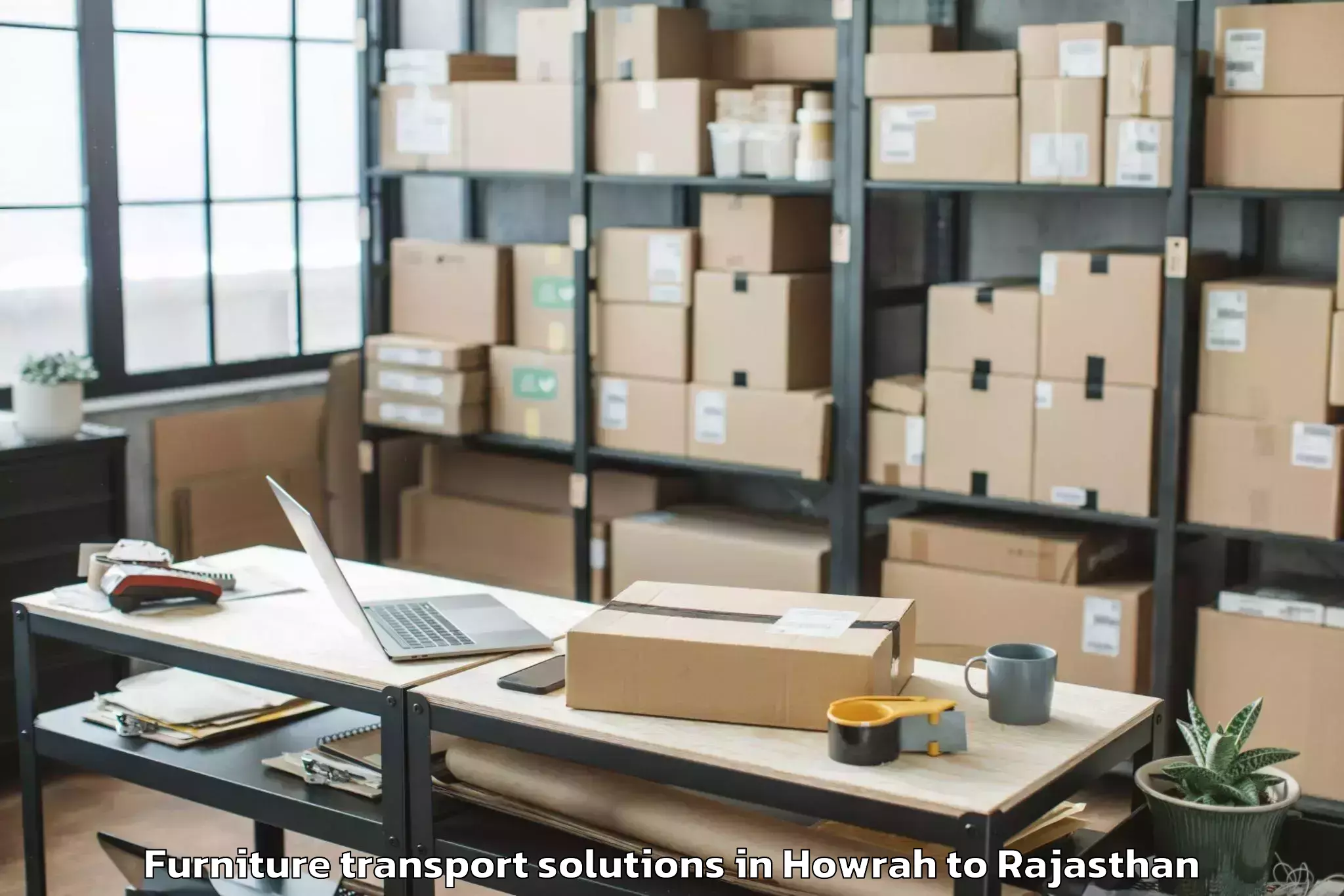 Trusted Howrah to Bamanwas Furniture Transport Solutions